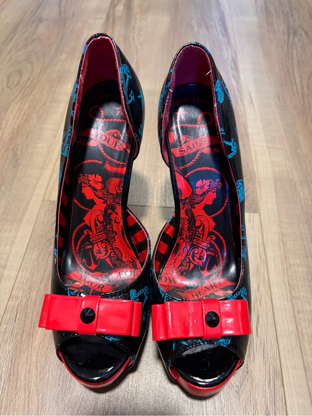 Iron Fist Black Peep-Toe Heels with Red Bow Accent